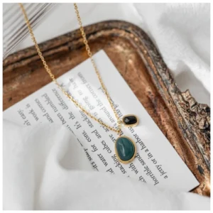2c6a22cab6198a06b7ee2c57d4.jpg@4e_500w_500h.src7C95Q.webp Light Luxury Design Green And Black Agate Pendant